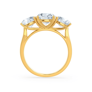 Gorgeous 1.50ct round three stone moissanite ring shown on a finger