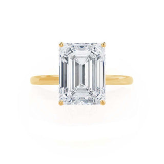 Delicate 1.01ct emerald solitaire moissanite ring side profile view