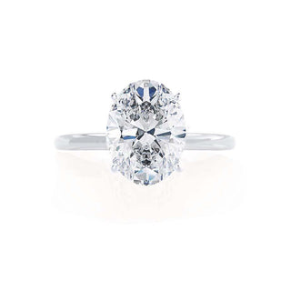 Lustrous 1.50ct oval solitaire moissanite ring side profile view
