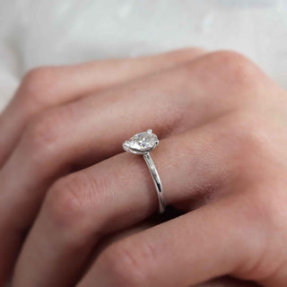 Dazzling 0.94ct pear solitaire moissanite ring top view