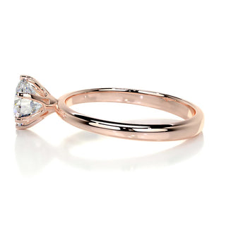Vintage 1.0ct round solitaire moissanite ring shown on a finger
