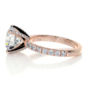 Shimmering 3.12ct round pave moissanite ring shown on a finger