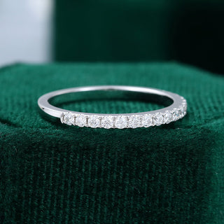 Classic 0.25ct round half eternity moissanite wedding band close up of the setting