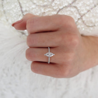 Classic 1.0ct marquise solitaire moissanite ring shown on a finger