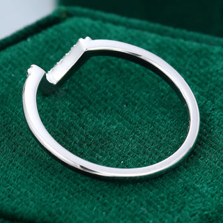 Radiant 0.09ct round moissanite wedding band top view