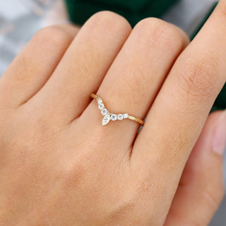 Shimmering 0.20ct round moissanite wedding band front view
