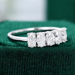 Exquisite 1.29ct oval moissanite wedding band side profile view