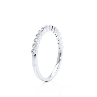 Bold 0.14ct round moissanite wedding band angled view showing its sparkle