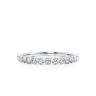 Bold 0.14ct round moissanite wedding band side profile view