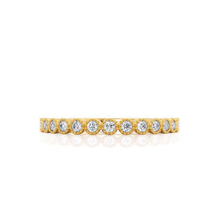 Classic 0.14ct round moissanite wedding band angled view showing its sparkle