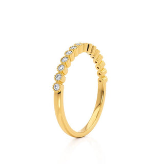 Classic 0.14ct round moissanite wedding band side profile view