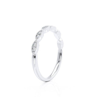 Gorgeous 0.16ct round moissanite wedding band side profile view