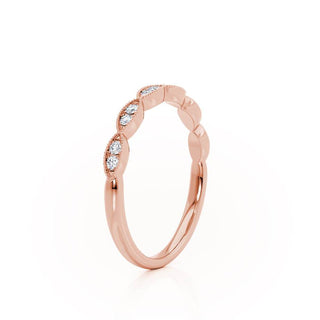 Refined 0.16ct round moissanite wedding band side profile view