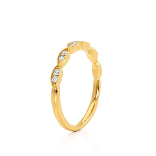 Sparkling 0.16ct round moissanite wedding band side profile view