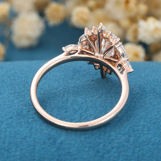 0.84 CT Oval Cluster Sparkling Moissanite Engagement Ring on hand
