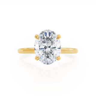 Bold 1.50ct oval hidden halo moissanite ring angled view showing its sparkle