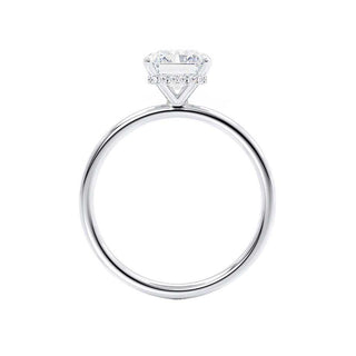 Dazzling 1.75ct emerald hidden halo moissanite ring shown on a finger