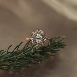 Stunning 0.75ct oval halo moissanite ring three quarter angled view