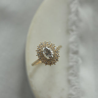 Stunning 0.75ct oval halo moissanite ring top view