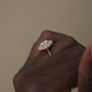 Stunning 0.75ct oval halo moissanite ring side profile view