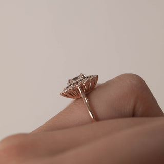 Classic 0.75ct oval halo moissanite ring side profile view