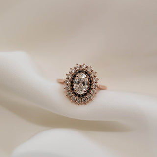 Classic 0.75ct oval halo moissanite ring close up of the setting
