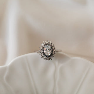Classic 0.75ct oval halo moissanite ring top view