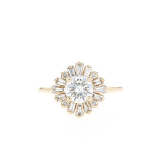 Brilliant 1.05ct round cluster moissanite ring shown on a finger