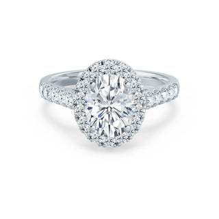 Modern 1.50ct oval halo moissanite ring shown on a finger image 2
