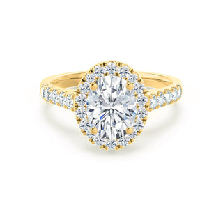 Modern 1.50ct oval halo moissanite ring shown on a finger image 3