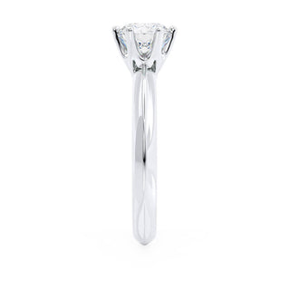 Graceful 1.0ct round solitaire moissanite ring shown on a finger image 3