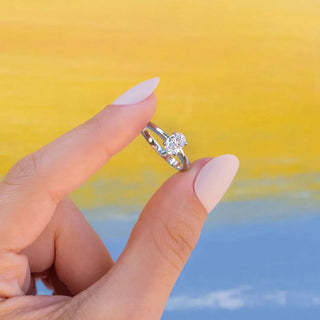 Elegant 1.33ct oval solitaire moissanite ring side profile view