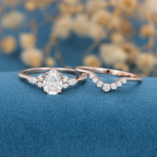 Shimmering 1.0ct pear cluster moissanite ring close up of the setting
