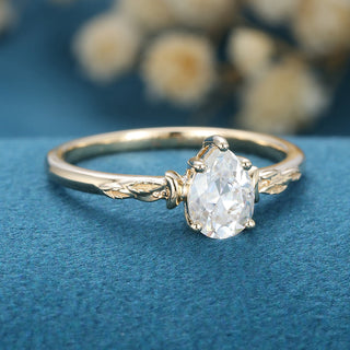 0.69 CT Pear Brilliant Cut Halo Moissanite Engagement Ring close up