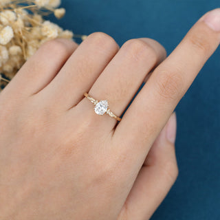 0.69 CT Pear Brilliant Cut Halo Moissanite Engagement Ring side view