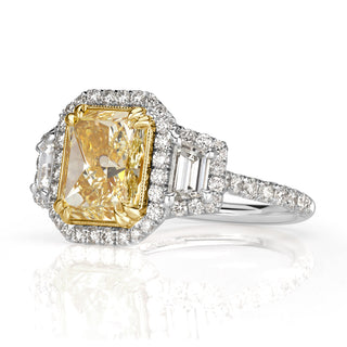 Fancy light yellow radiant halo moissanite ring side detail view