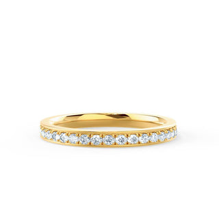 Dazzling 0.16ct round half eternity moissanite wedding band side profile view
