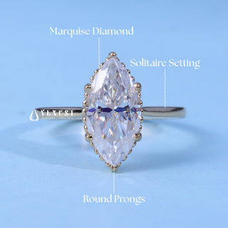 Delicate 1.50ct marquise moissanite ring shown on a finger