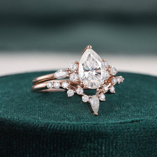 1.50 CT Pear Brilliant Cluster Halo Moissanite Bridal Set close up
