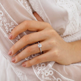 Elegant 1.20ct round solitaire moissanite ring angled view showing its sparkle