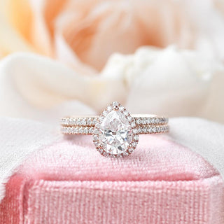 Luminous 1.33ct pear halo moissanite ring front view
