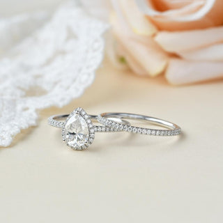 Stunning 1.33ct pear halo moissanite ring shown on a finger