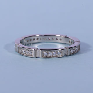 Luminous round pave moissanite wedding band front view