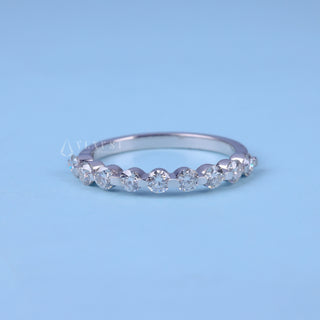 Exquisite round pave moissanite wedding band front view