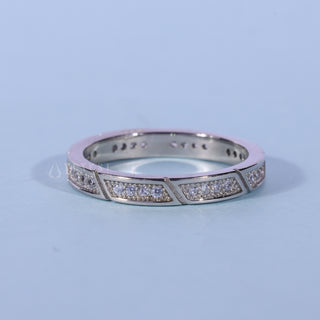 Stunning round pave moissanite wedding band front view