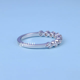 Exquisite round pave moissanite wedding band angled view showing its sparkle