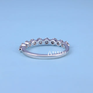 Exquisite round pave moissanite wedding band side profile view