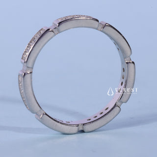 Luminous round pave moissanite wedding band side profile view