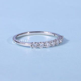 Elegant round half eternity moissanite wedding band close up of the setting