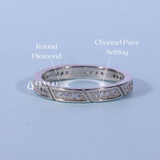 Stunning round pave moissanite wedding band shown on a finger